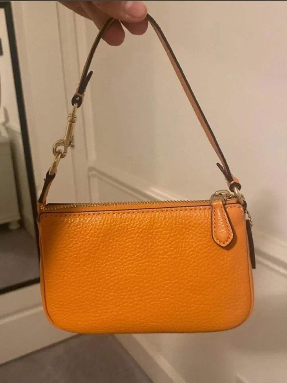 Coach Orange Pebbled Leather Wristlet with Gold Hardware
